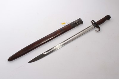 Lot 975 - Scarce First World War 1907 pattern bayonet with hooked quillion, fullered steel blade retaining almost all original finish, stamped Sanderson, 10' 08, in brown leather scabbard, stamped H.G.R. 08