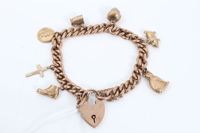 Lot 104 - 9ct gold curb link bracelet with seven gold charms