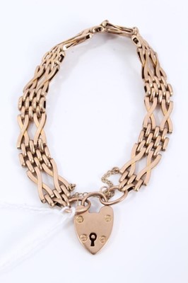 Lot 105 - 9ct gold gate bracelet with padlock clasp