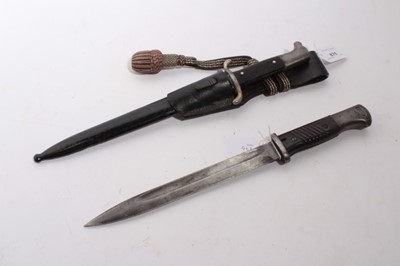 Lot 876 - Second World War Nazi Fire brigade dress Bayonet with black checkered plastic grip and polished steel blade (retaining almost all original finish) by Puma, Solingen, in black painted steel scabbard...