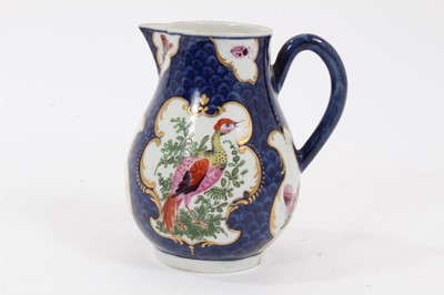 Lot 199 - Worcester milk jug, c.1770, polychrome decorated with exotic birds and insects within scrolled cartouches, on a blue scale ground, pseudo-Chinese mark to base, 9.75cm high