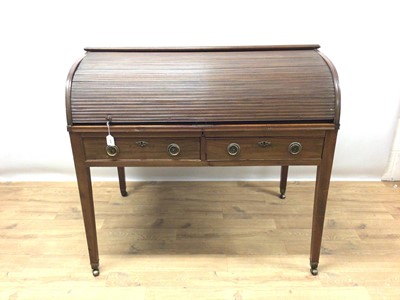 Lot 945 - Late 19th / early 20th century mahogany roll top desk