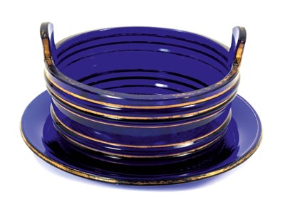 Lot 224 - Early 19th century Bristol blue glass cream bowl and stand, with gilt highlights, the stand measuring 23cm diameter