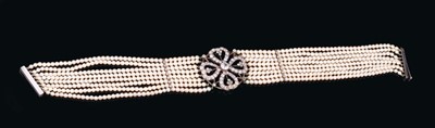 Lot 525 - Diamond and cultured pearl choker necklace, the diamond openwork plaque with a four-leaf clover design centred with a principal old cut diamond estimated to weigh approximately 1.2cts, with old cut...