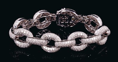 Lot 536 - Diamond and 18ct white gold bracelet with large pavé set diamond chain links, estimated total diamond weight approximately 7.5cts. Length approximately 18cm.