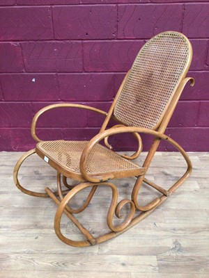 Lot 410 - Bentwood rocking chair and a mahogany wall cabinet (2)