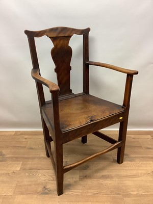 Lot 1513 - 18th century fruitwood country elbow chair