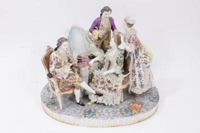 Lot 245 - Large continental porcelain group, depicting ladies and gentlemen at a dressing table, in the rococo style, mark to base, 23.5cm high x 31cm across