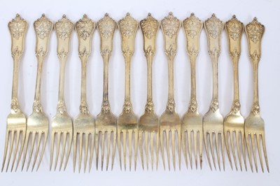 Lot 49 - Twelve late 19th/early20th century German Silver-Gilt Dessert Forks, Rococo pattern, from the Royal Prussian Collection, each piece cast and chased on one side with the Royal Prussian Eagle and rev...