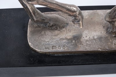 Lot 906 - Bernard Winskill (d. 1980) fine sterling silver model of a horse and rider, in the manner of a dressage competition, hallmarked and raised on black marble plinth, approximately 32cm long
