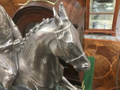 Lot 906 - Bernard Winskill (d. 1980) fine sterling silver model of a horse and rider, in the manner of a dressage competition, hallmarked and raised on black marble plinth, approximately 32cm long