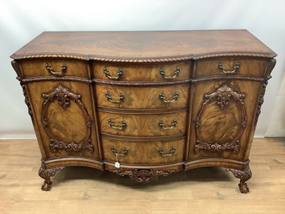 Lot 1492 - Fine quality Chippendale revival serpentine sideboard