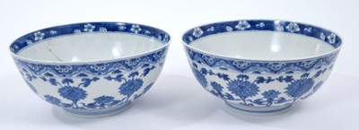 Lot 257 - Good pair of Chinese blue sprig and white porcelain bowls, Chenghua marks but 18th/19th century, painted with a continuous lotus pattern, 16cm diameter