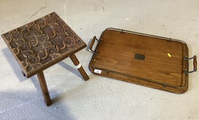 Lot 129 - Edwardian oak and brass two handled tray and a small carved stool