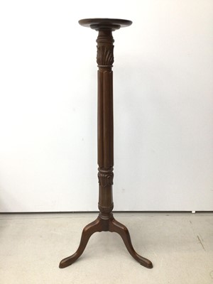 Lot 164 - Victorian mahogany torchere with reeded column on three splayed legs, 154cm high