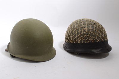 Lot 925 - Israeli MIC - style paratrooper helmet with three point harness and liner, circa 1970s, together with Israeli armoured vehicle crewman's helmet with liner (2)
