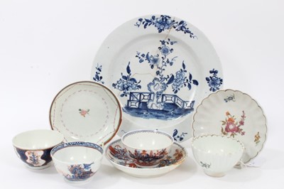 Lot 270 - Collection of Lowestoft pieces, including a tea bowl and saucer of fluted form, painted with scattered flower sprays and sprigs, a further tea bowl and saucer printed in blue with a Chinese river s...