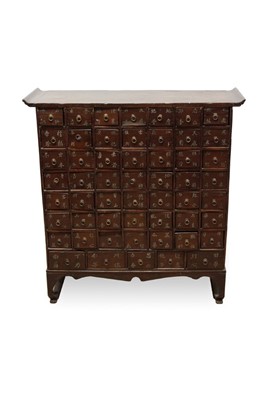 Lot 1446 - 19th century Korean apothecary chest containing fifty-four drawers, each with script to front, raised on bracket feet, 88cm wide x 31cm deep x 93cm high 
Provenance: purchased from 'Happy Joss', Ho...