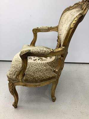 Lot 145 - Gilt framed open elbow chair with floral upholstered seat and back on cabriole front legs