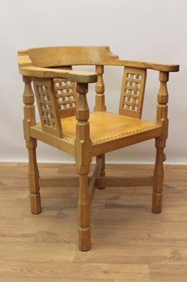 Lot 1299 - Robert Mouseman Thompson carved oak tub chair, with lattice back and stud closed leather seat on chamfered supports with signature mouse to front leg