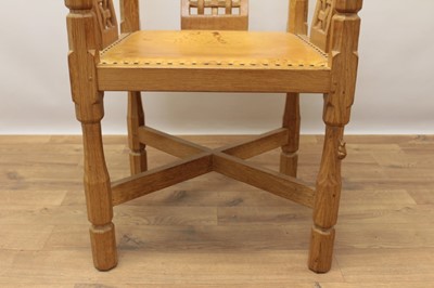 Lot 1299 - Robert Mouseman Thompson carved oak tub chair, with lattice back and stud closed leather seat on chamfered supports with signature mouse to front leg