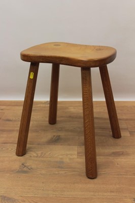 Lot 1298 - Robert Mouseman Thompson oak stool, with saddle seat, signature mouse to one side