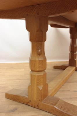 Lot 1296 - Robert Mouseman Thompson carved oak refectory table, rounded rectangular adzed top on facetted ends and sledge base united by a foot stretcher. signature mouse to one pedestal, 86 x 170cm