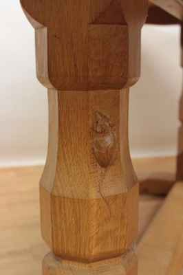 Lot 1296 - Robert Mouseman Thompson carved oak refectory table, rounded rectangular adzed top on facetted ends and sledge base united by a foot stretcher. signature mouse to one pedestal, 86 x 170cm