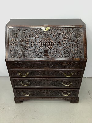 Lot 181 - Georgian oak bureau with fitted interior including well, three long graduated drawers below on bracket feet, 90cm wide x 52cm deep x 107cm high