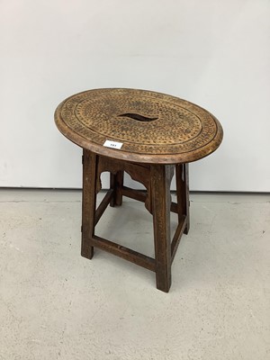 Lot 191 - Eastern folding occassional table with brass inlay