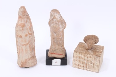 Lot 993 - Two Tanagra terracotta figures together with a Tanagra head fragment
