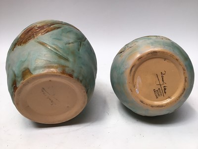 Lot 1058 - Two Bourne Denby Danesby vases, one decorated with fish, 24cm high, the other decorated with birds, 21.5cm high