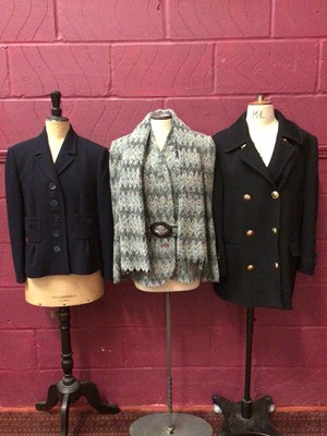 Lot 1977 - Laura B Couture clothing including two boucle wool skirt suits, green wool crepe 3/4 coat with velvet trim and yellow metal chain inside hem, a soft boucle knit jacket, navy jacket and a 3/4 length...