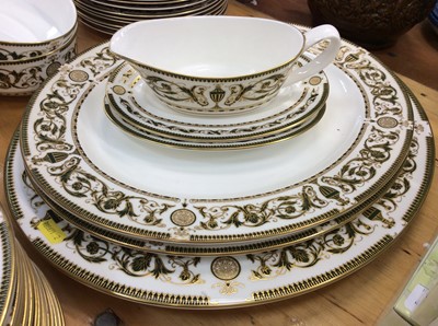 Lot 1166 - Royal Worcester 16 place setting dinner service in the Windsor pattern, comprising: 16 dinner plates, 16 pudding plates, 16 side plates, 15 small sides plates, 3 serving platters, 2 vegetable dishe...