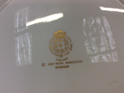 Lot 1166 - Royal Worcester 16 place setting dinner service in the Windsor pattern, comprising: 16 dinner plates, 16 pudding plates, 16 side plates, 15 small sides plates, 3 serving platters, 2 vegetable dishe...
