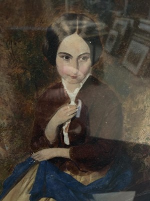 Lot 66 - Victorian School, oil on board, An attractive woman seated in a woodland setting, in gilt frame. 27 x 21cm