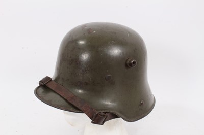 Lot 732 - First World War German Model 1915 steel helmet with original green painted finish and original liner and chinstrap