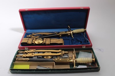 Lot 955 - Two Cold War East German Officials Dress Daggers, in original boxes with hangers (2)