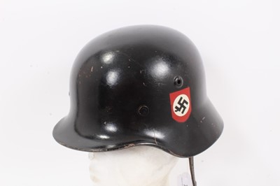 Lot 759 - Second World War Nazi M.35 steel helmet with black painted finish and SS decals -added and modified post-war