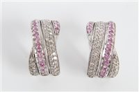 Lot 3201 - Pair pink sapphire and diamond set half hoop...