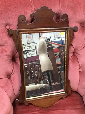 Lot 864 - Georgian mahogany wall mirror with shaped scroll frame