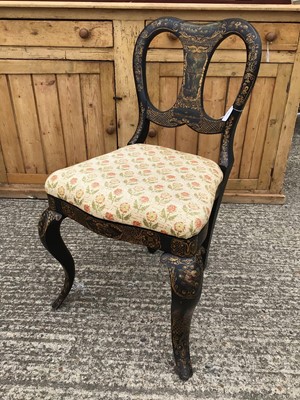 Lot 927 - 19th century lacquered side chair, the shaped back painted with waterfall and coastal scene within gilt scroll borders, drop-in seat, one scroll legs