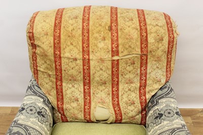 Lot 1400 - Late 19th / early 20th century easy chair by Howard & Sons Ltd.
