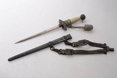 Lot 964 - Nazi 1937 Pattern Luftwaffe Officers' Dress Dagger with polished steel blade by WMW Waffen, Luftwaffe Eagle crossguard, wire bound cream celluloid grip, in scabbard, with silver bullion thread dres...