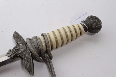 Lot 964 - Nazi 1937 Pattern Luftwaffe Officers' Dress Dagger with polished steel blade by WMW Waffen, Luftwaffe Eagle crossguard, wire bound cream celluloid grip, in scabbard, with silver bullion thread dres...