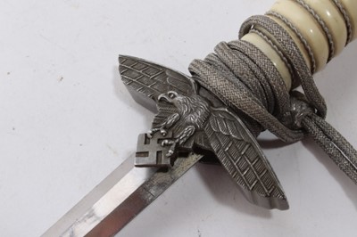 Lot 964 - Nazi 1937 Pattern Luftwaffe Officers' Dress Dagger with polished steel blade by WMW Waffen, Luftwaffe Eagle crossguard, wire bound cream celluloid grip, in scabbard, with silver bullion thread dres...