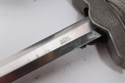 Lot 964 - Nazi 1937 Pattern Luftwaffe Officers' Dress Dagger with polished steel blade by WMW Waffen, Luftwaffe Eagle crossguard, wire bound cream celluloid grip, in scabbard, with silver bullion thread dres...