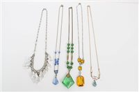 Lot 3202 - Five Art Deco crystal necklaces - including...