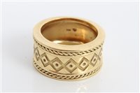 Lot 3203 - Gold (18ct) thick band ring with geometric...