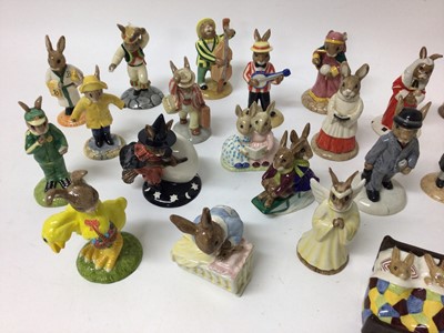 Lot 1156 - Twenty-nine Royal Doulton Bunnykins figures - Rainy Day, New Baby, Angel, Schoolmaster, Sailor, Gardener, Easter Parade, Judge, Easter Greetings, Bathtime, Businessman, Billie & Buntie, Stop Watch,...